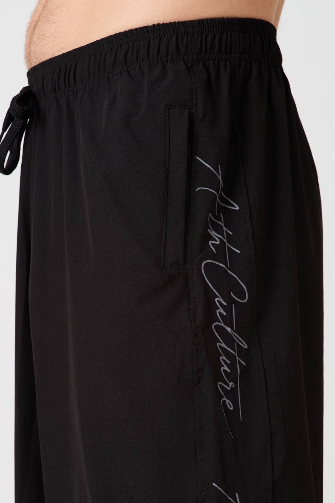 ATHCULTURE Signature Script Track Pant — Black