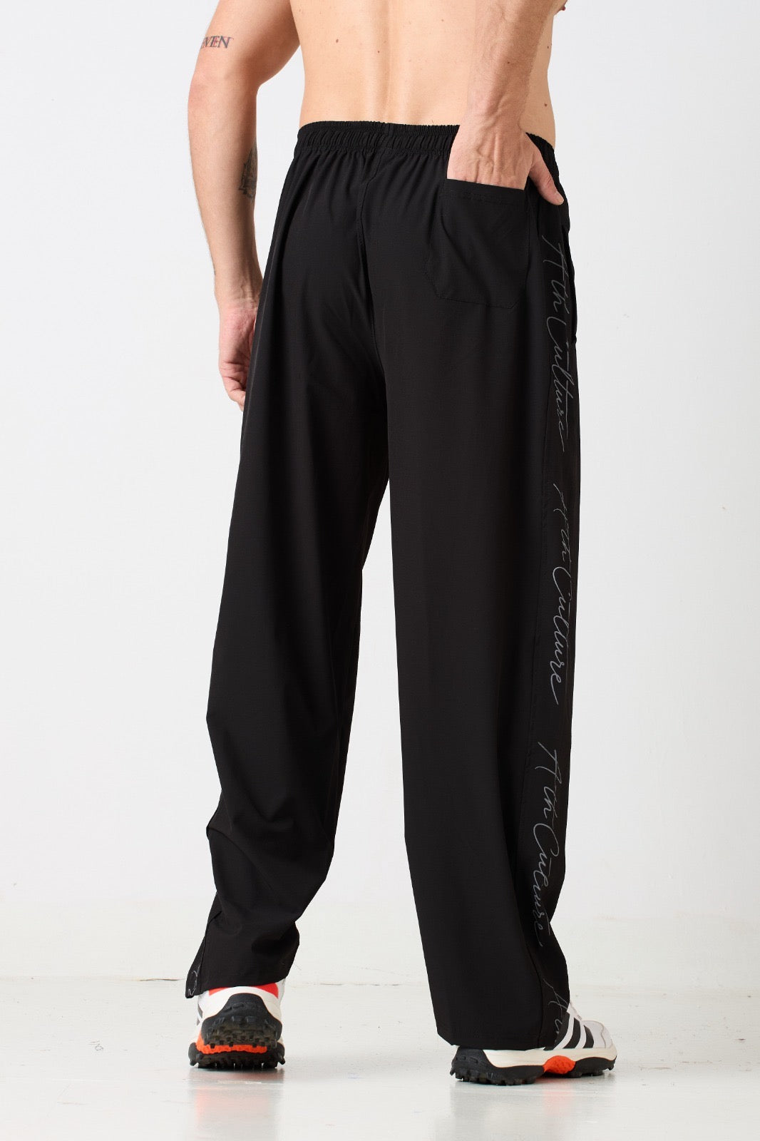 ATHCULTURE Signature Script Track Pant — Black